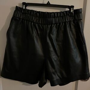 Black faux leather shorts, size large